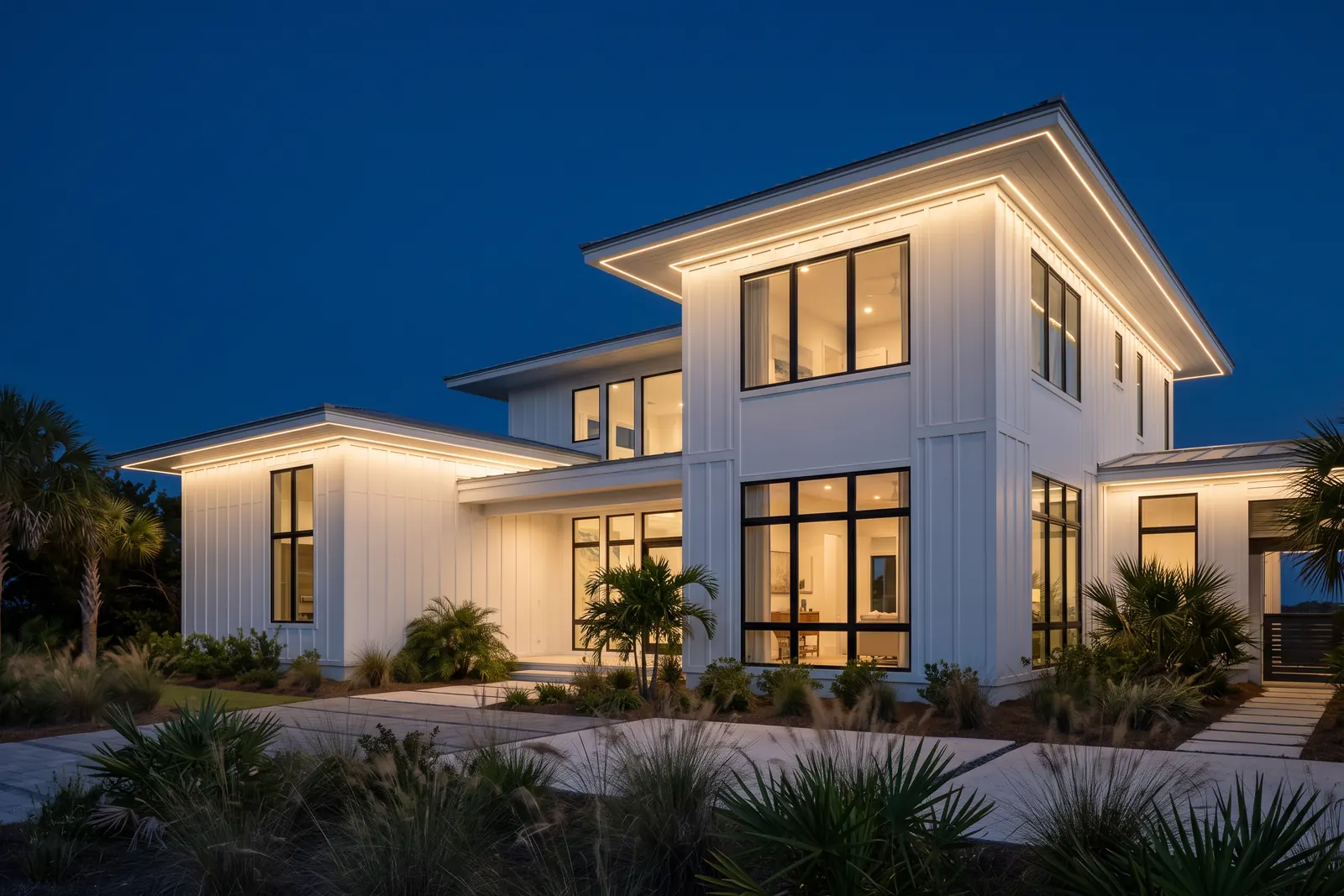 Modern coastal home with warm-white permanent eave lighting, design concept